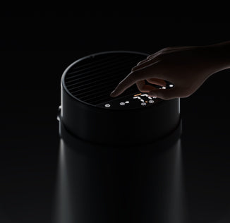 A hand interacting with Maxi Pro digital display