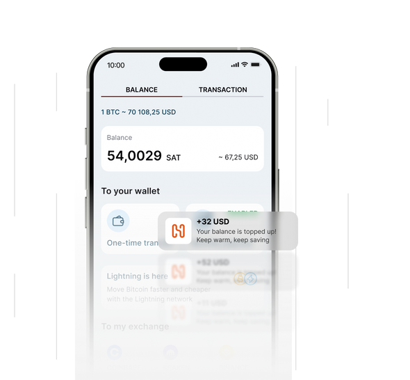 Smartphone displaying a crypto balance and incoming transactions in Heatbit app