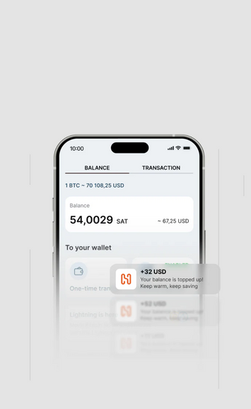 Smartphone displaying a crypto balance and incoming transactions in Heatbit app